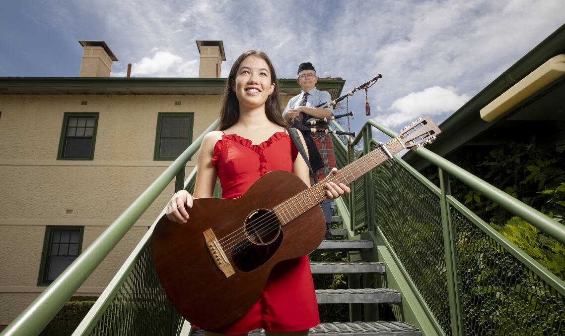 National Folk Festival youth ambassador Lucy Sugerman and bagpiper Athol Chalmers at the launch of the 2020 National Folk Festival. Picture: Sitthixay Ditthavong