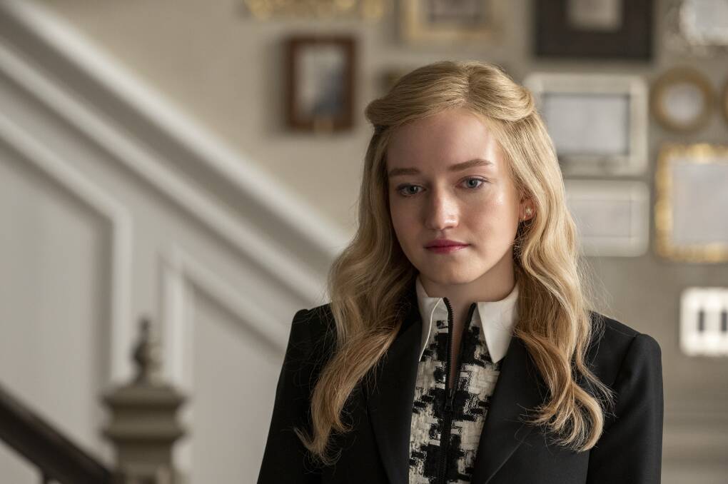 Julia Garner plays the real-life Anna Delvey, who was jailed for racking up huge bills while pretending to be a rich German heiress. Picture: Netflix