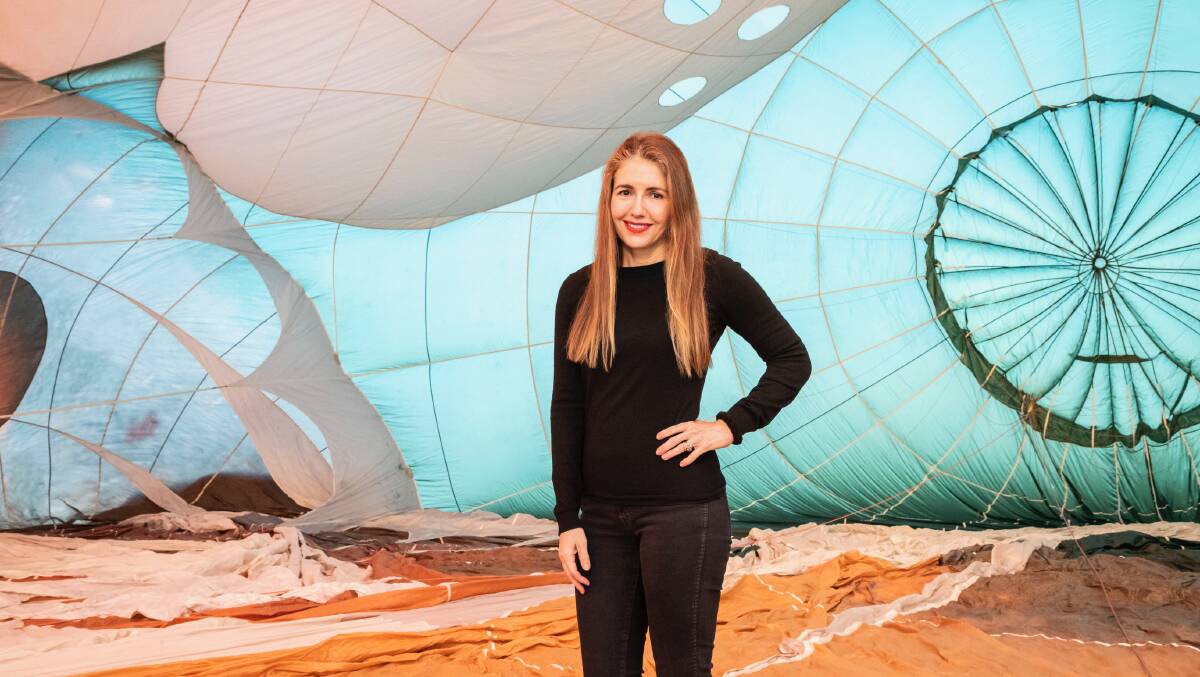 Artist Patricia Piccinini inside her famous creation. Picture supplied