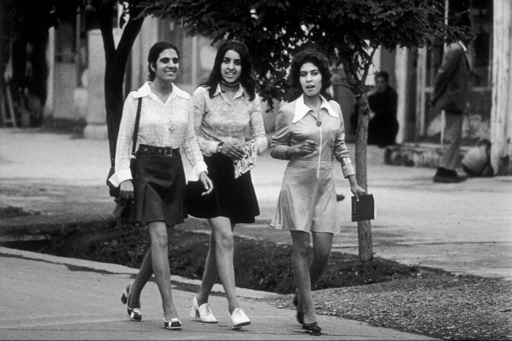 Students in short skirts walk in the streets of Kabul in 1972. Picture: Getty Images