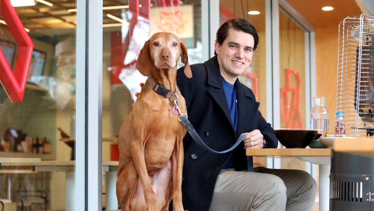 Barrister Brodie Buckland with his dog Juno. Picture: James Croucher