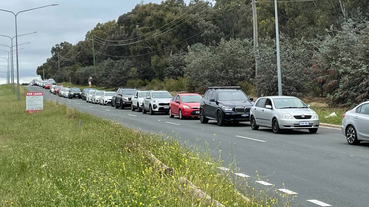 Traffic was backed up from the Mitchell testing centre to the crematorium on Thursday morning. Picture: The Canberra Times