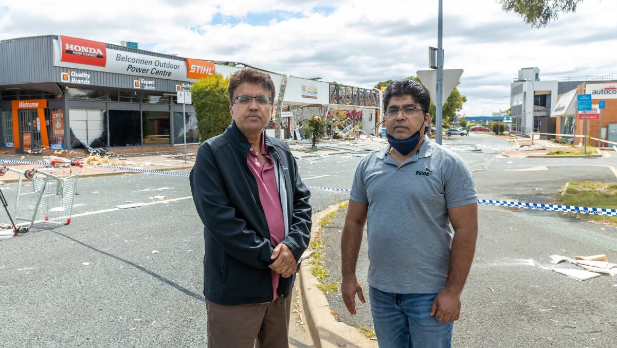 Kingsley' Belconnen franchisee Azhar Javed and Jazaa Halal Foods owner Mohammad Ikram at the scene of Monday nights explosion in Belconnen. Picture: Sitthixay Ditthavong