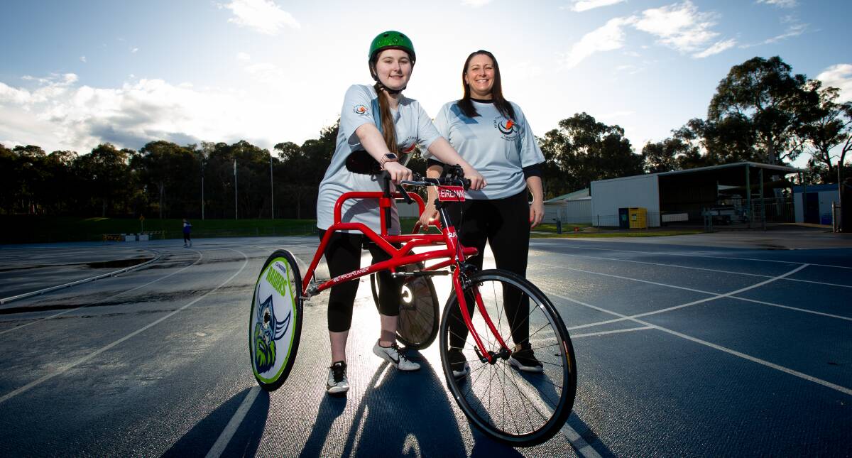  Eireann Wood and Beke Pyne are part of Now I Can Run which allows children with cerebral palsy to run. Picture: Elesa Kurtz