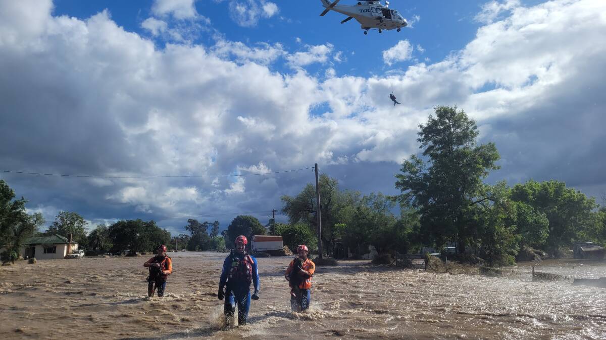 NSW SES members assist during flooding in NSW town of Eugowra. Picture by NSW SES media
