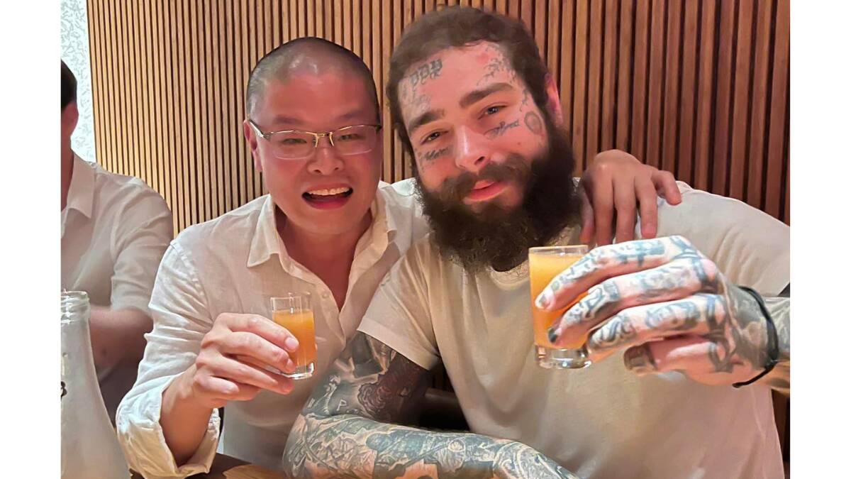 Raku executive chef and owner Hao Chen with Post Malone. Picture Facebook
