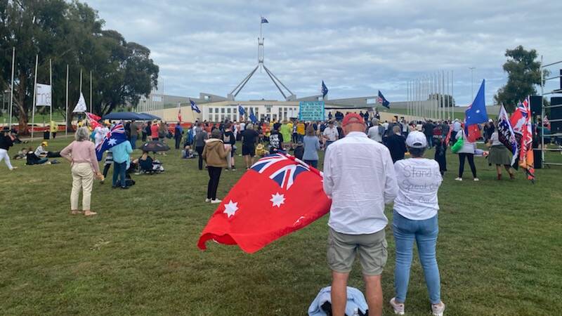 Protesters at a rally earlier on Tuesday outside Parliament House. Picture: Finn McHugh