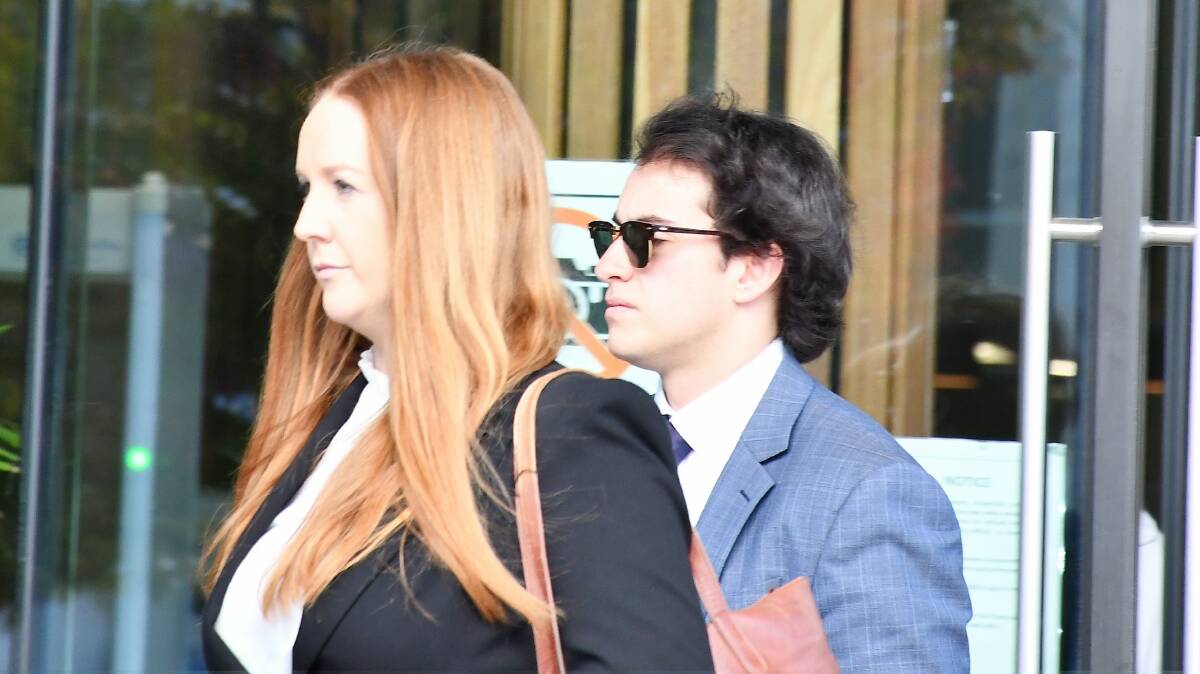 Thomas Earle, right, leaves court with his solicitor, Trudie Cameron. Picture by Hannah Neale