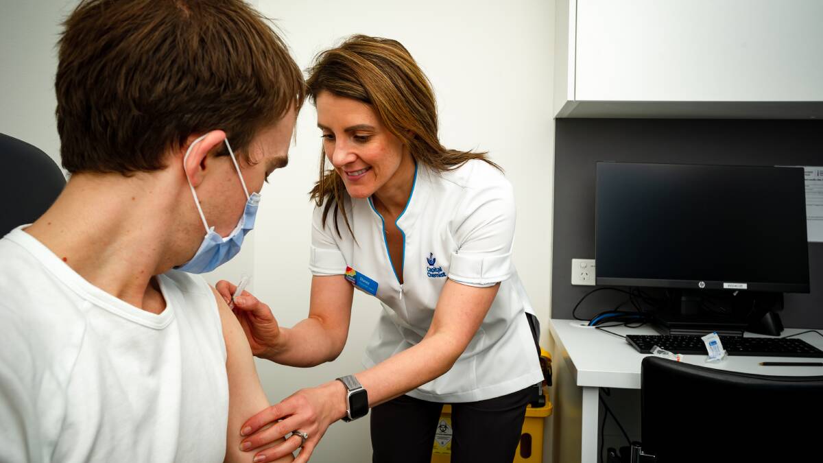Pharmacist and co-owner at Capital Chemist Southlands Stacey Fuller administers a COVID-19 vaccine. Picture: Elesa Kurtz