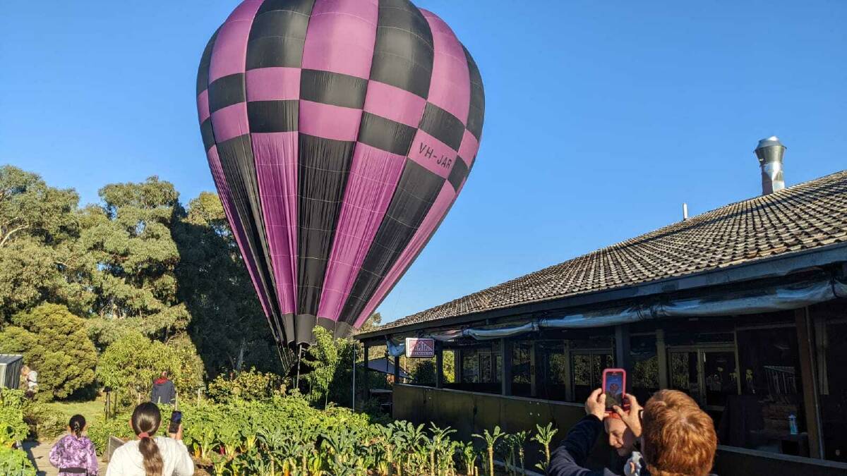 The hot air balloon at a cafe in Aranda. Picture: Trent Kerin