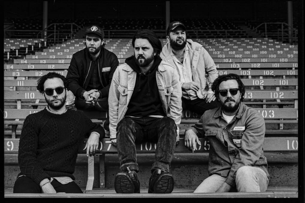 DARK DAYS: Bad//Dreems guitarist and songwriter Alex Cameron, top right, admits it was difficult spending the majority of 2020 dislocated from the music industry. Picture: Ian Laidlaw
