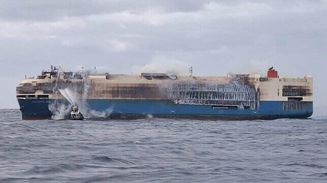 ALIGHT: Crew rescued from burning cargo ship carrying up to 1000 luxury vehicles. Picture: Portuguese Navy (supplied)