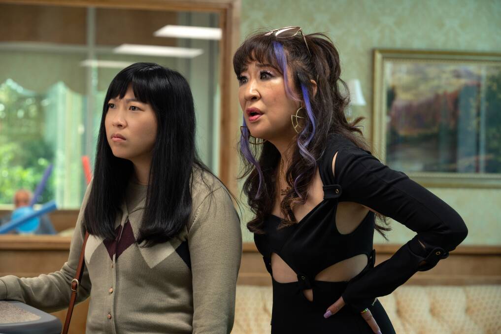 Awkwafina and Sandra Oh play sisters Anne and Jenny Yum in Quiz Lady. Picture by Disney+