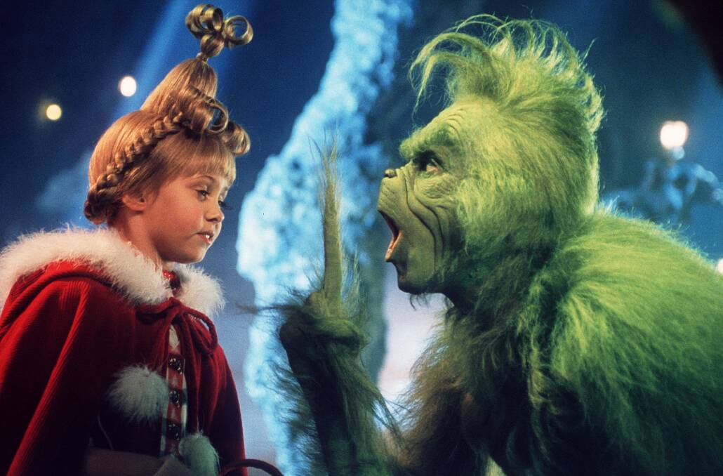 Taylor Momsen and Jim Carrey star in The Grinch (2000)