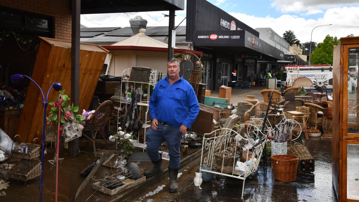 Cabonne mayor Kevin Beatty in the clean-up at Molong on Monday. Picture by Carla Freedman.