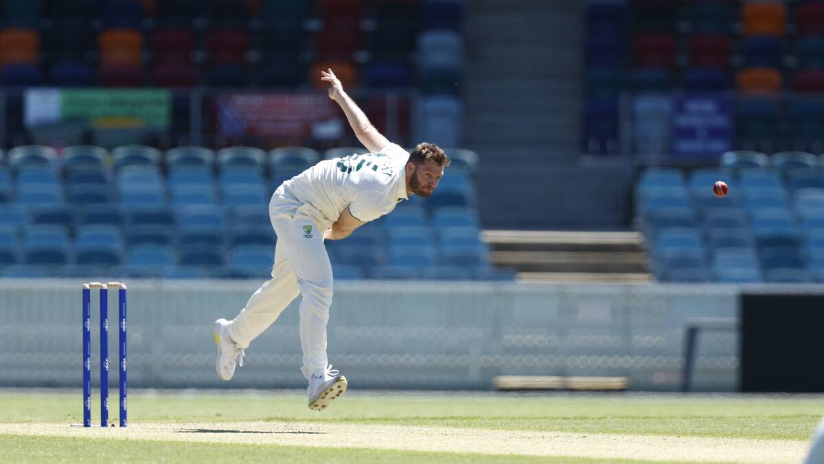 Mark Steketee bowls during a long day in the field for the Prime Minister's XI. Picture by Keegan Carroll