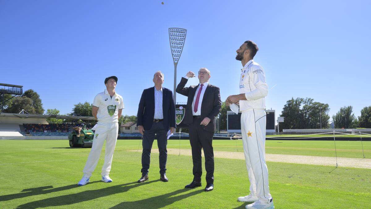 Prime Minister Anthony Albanese tosses the coin prior to Wednesday's match. Picture by Keegan Carroll
