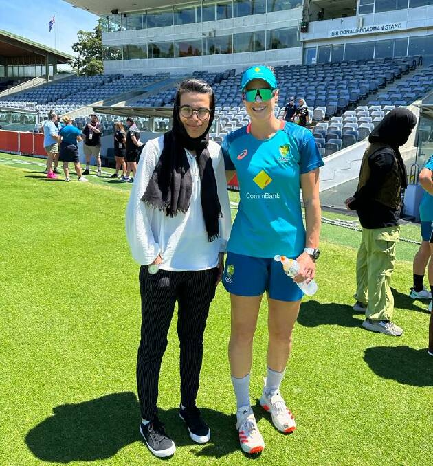 Nilab Stanikzai and Ellyse Perry. Picture supplied
