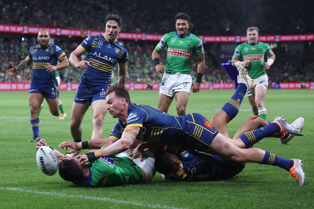 Jordan Rapana has the ball dislodged. Picture Getty Images
