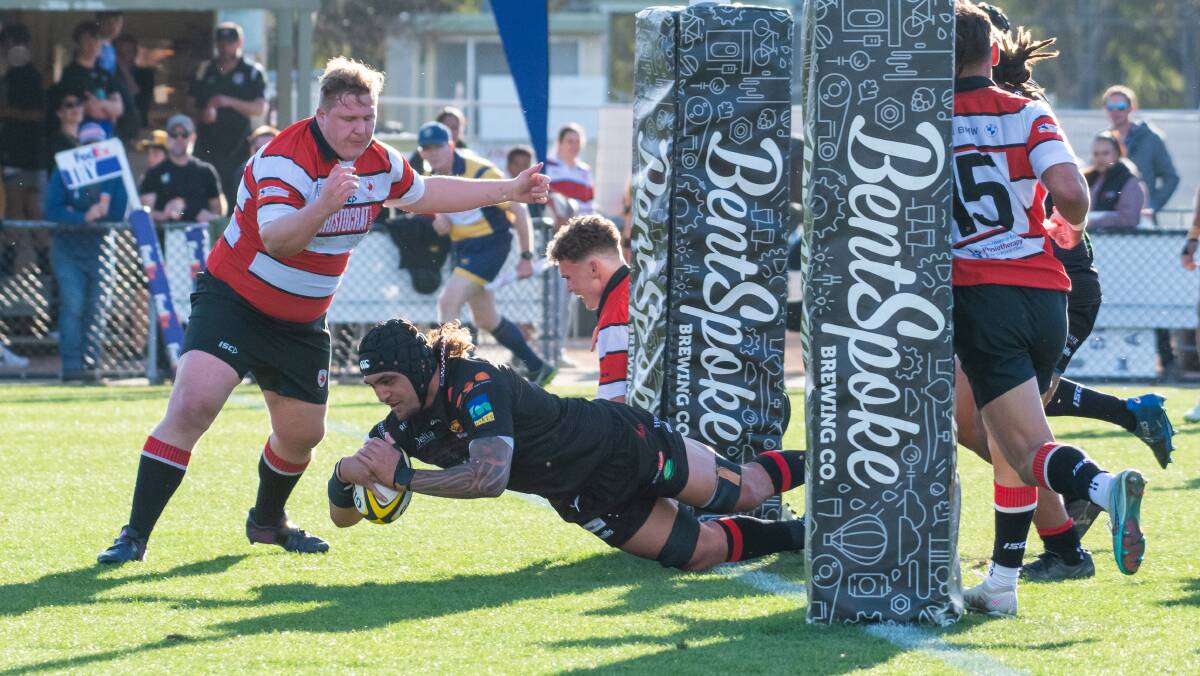 Gungahlin's Jahrome Brown crosses for the opening try of Saturday's John I Dent Cup grand final. Picture by Elesa Kurtz