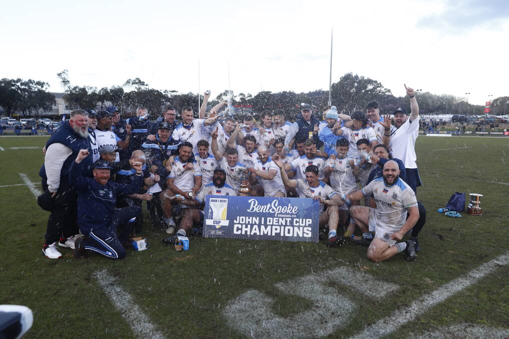 The Queanbeyan Whites celebrate Saturday's John I Dent Cup grand final victory. Picture by Keegan Carroll
