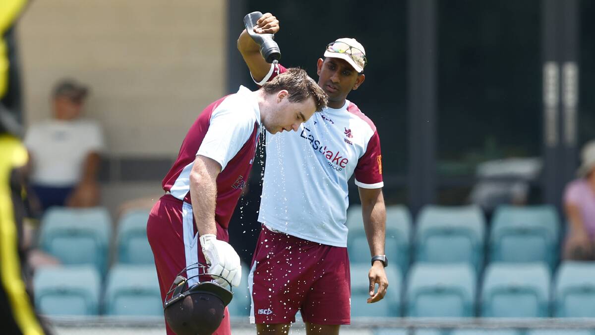Wests' Lachlan Malcolm attempts to cool down in Saturday's heat. Picture by Keegan Carroll