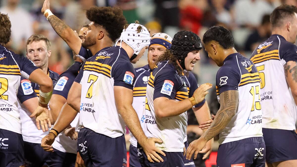 The ACT Brumbies celebrate Lachlan Lonergan's try in Saturday night's victory over the Reds. Picture by Sitthixay Ditthavong