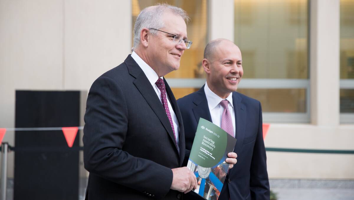 The Prime Minister Scott Morrison and the Treasurer Josh Frydenberg selling the 2021 budget on Wednesday. Picture: Sitthixay Ditthavong