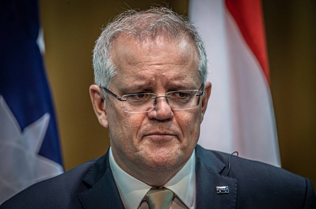 Scott Morrison has outlined the process by which social distancing restrictions will be eased. Picture Karleen Minney