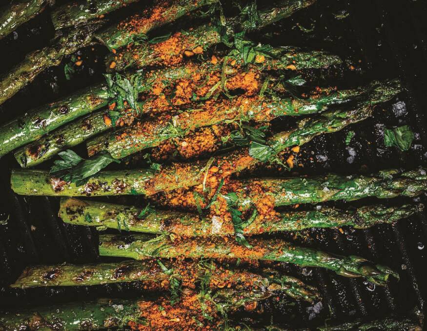 Charred asparagus with gunpowder nut masala from The Flavor Equation. Picture: Nik Sharma 