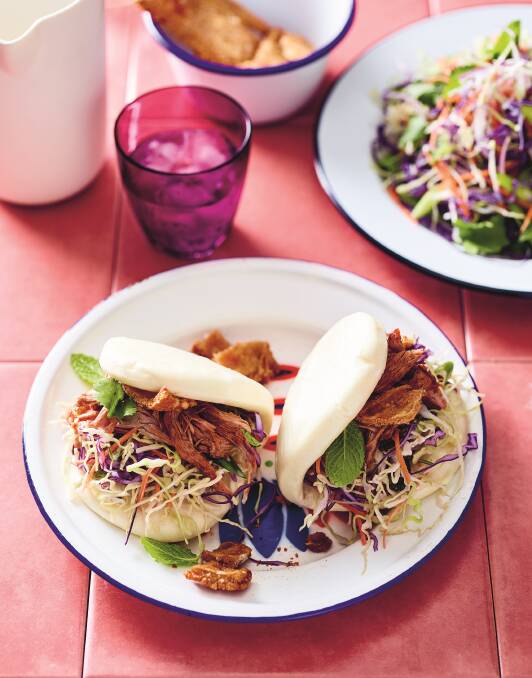 Duck bao buns with pork crackle and Asian slaw. Picture: Mark Roper