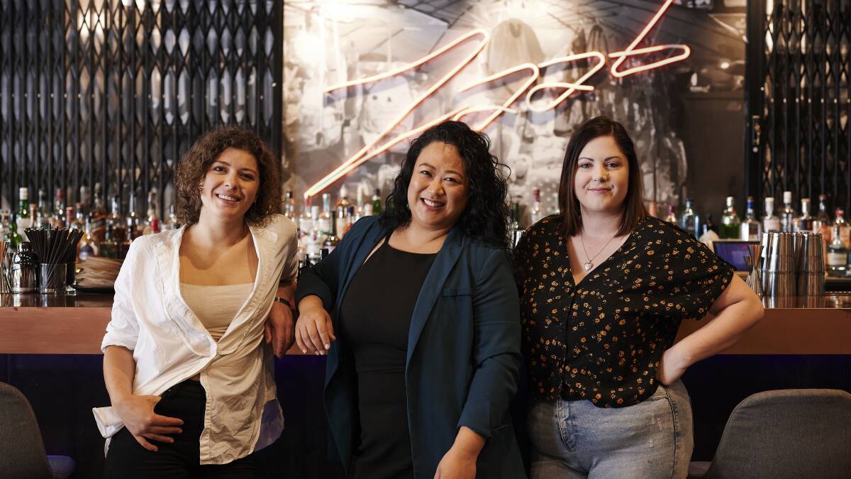 Charlotte Steves, Becky Khanthavongsa and Talia Cullss have organised the IWD events. Picture: Pew Pew Studios