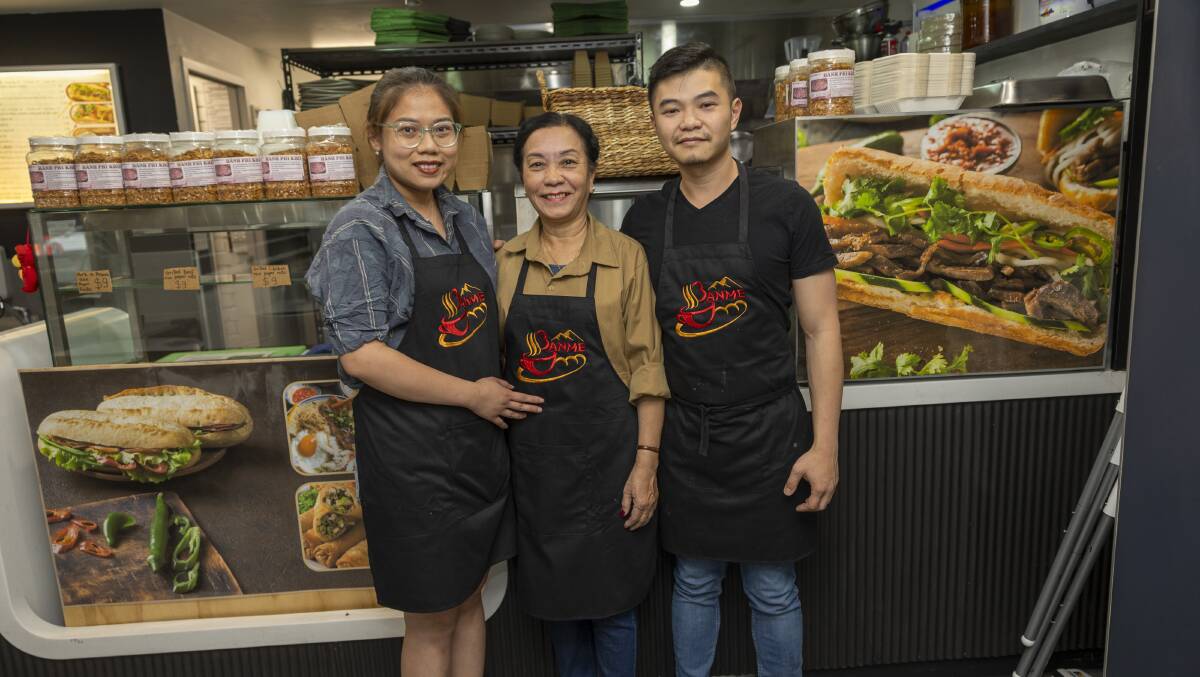 Kathy Phan, Thi Thuy Hang and Tommy Nguyen at BanMe in Braddon. Picture by Gary Ramage