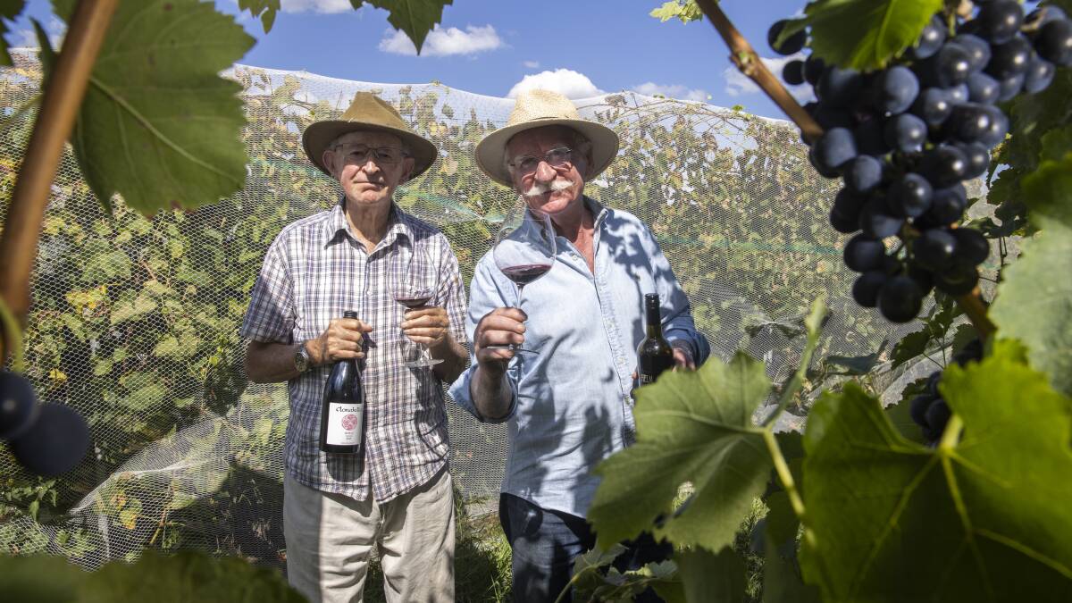 John Kirk and Ken Helm celebrate 50 years of the Canberra District wine region in 2021. Picture by Keegan Carroll