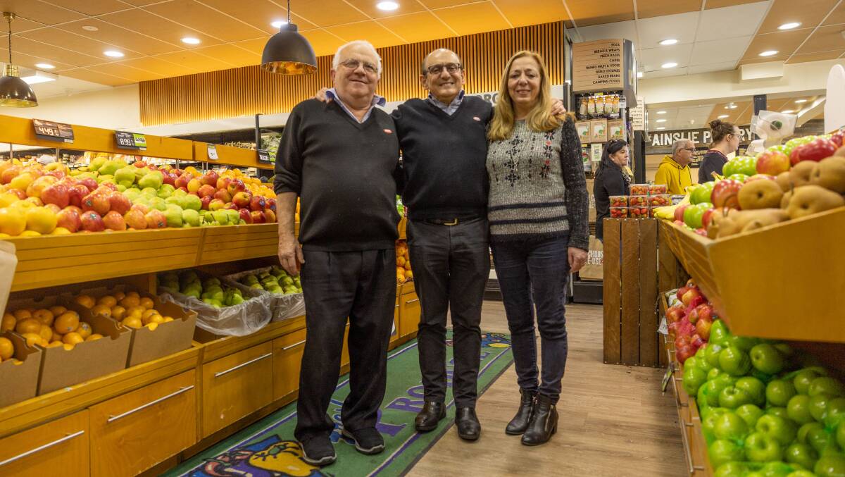 Dominic Mammoliti, left, has worked at the IGA for 40 years, with co-owners Manuel Xyrakis and Irene Mihailakis. Picture by Gary Ramage