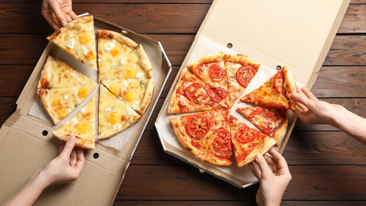 A slice of pizza happiness. Picture: Shutterstock