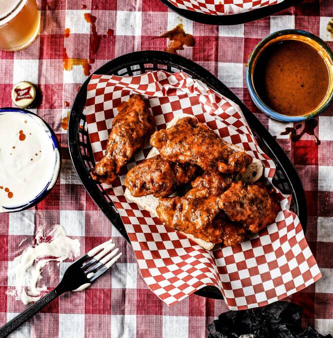 Hot sauce chicken ribs with blue cheese dipping sauce. Picture: Julian Kingma