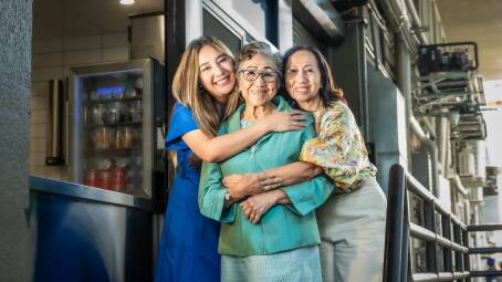 Natsha Yota, left, with her grandmother Nith Chantharasy, and mother Sou Yota at Tuckshop Tamada in the city. Picture by Karleen Minney