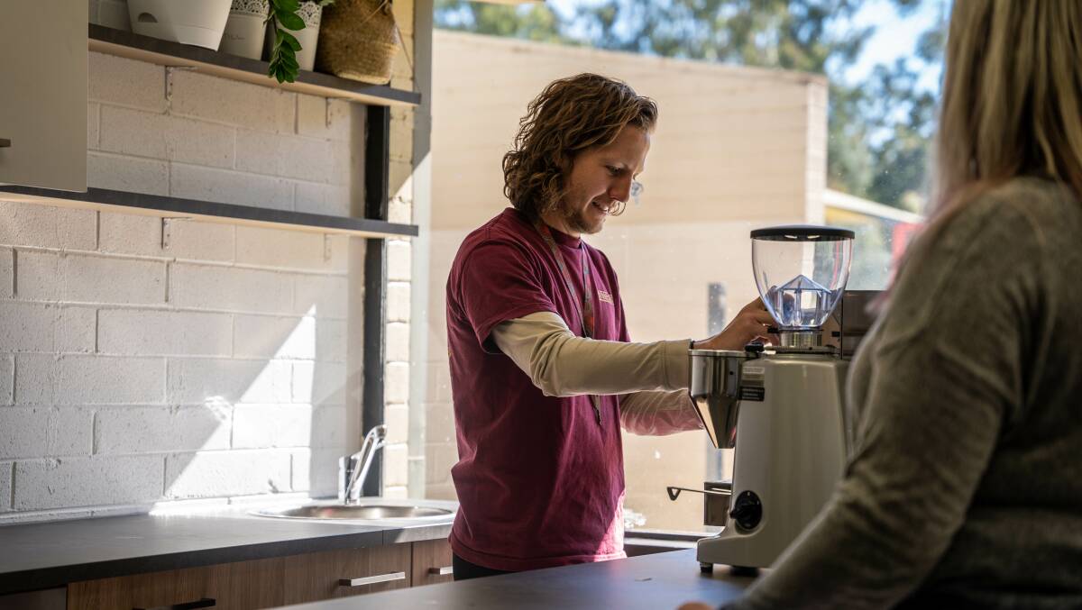 James Keeley, a youth support worker at the school, pours a coffee. Picture: Supplied