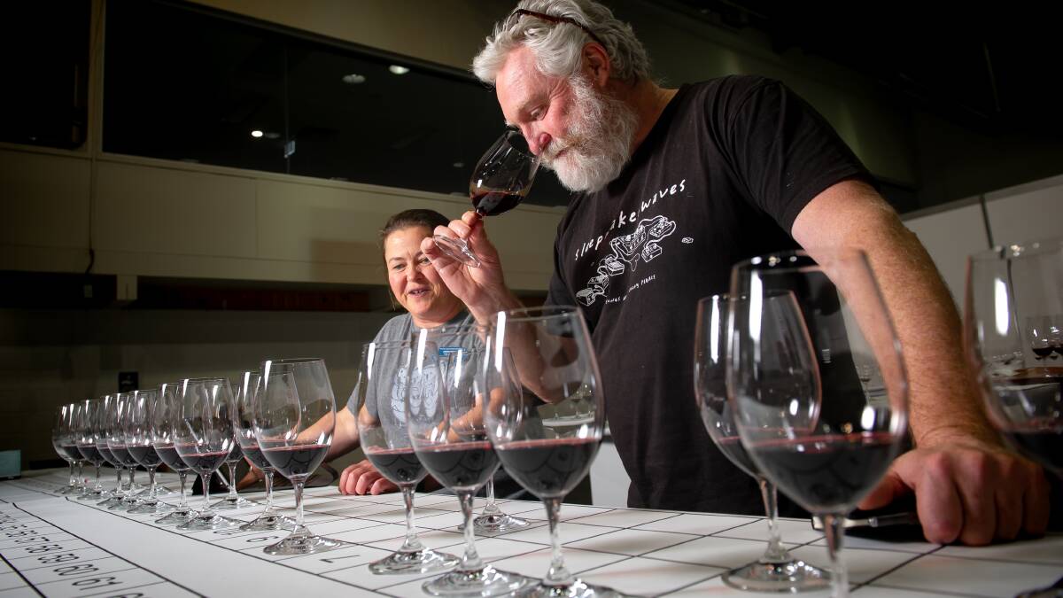 Sarah Crowe and chair of judges David Bicknell at the National Wine Show at Exhibition Park in Canberra. Picture: Elesa Kurtz 