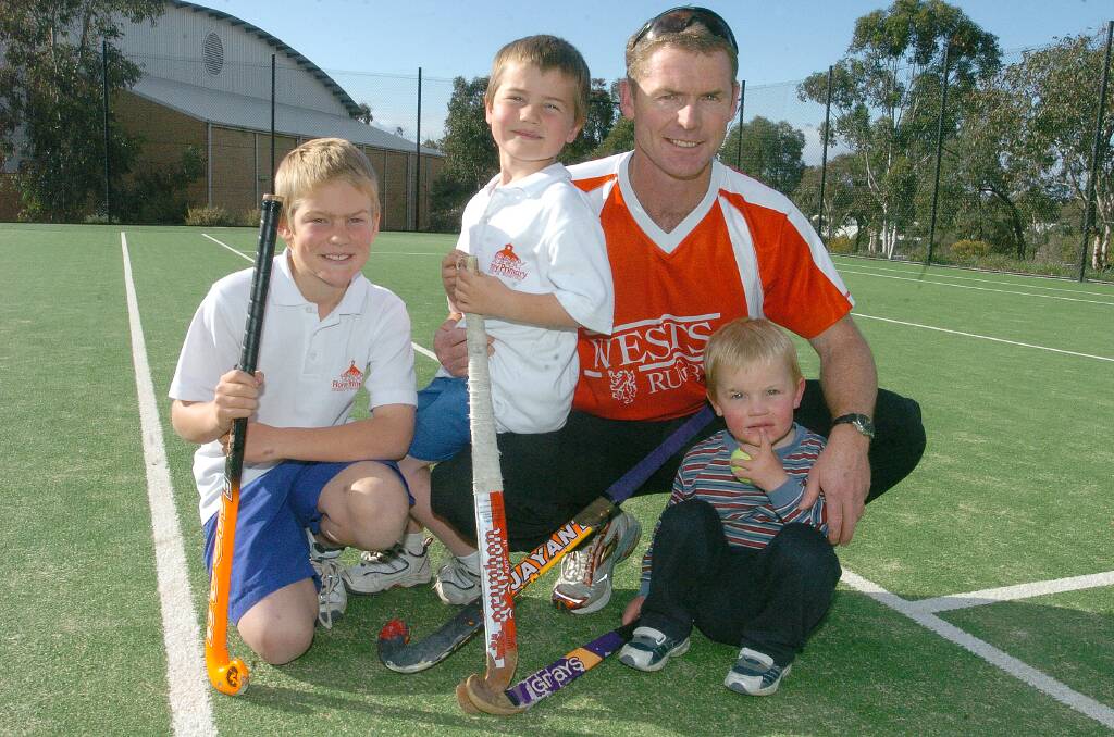 Sport has always played a part in the life of the Macdonalds. Blake, then 9, Jay, 6, and Darcy, 2, join their father at Radford College in 2007. Picture: Martin Jones