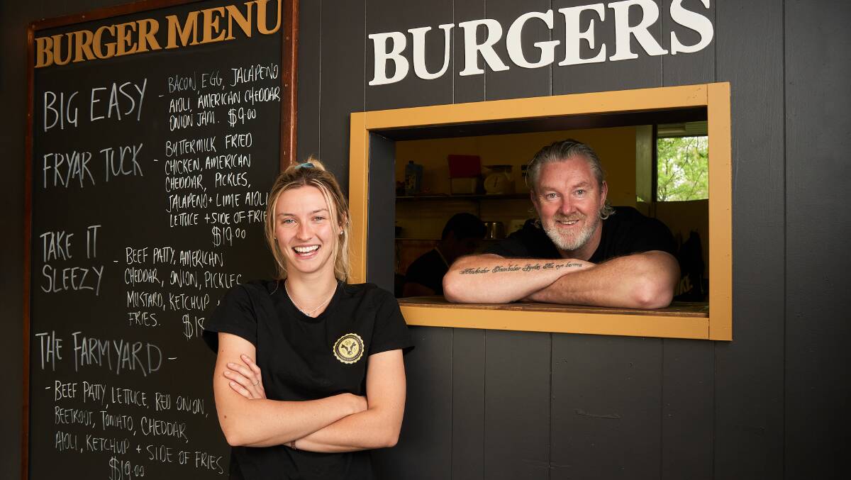 Felicity Yates and Will Cowie serving up burgers and brownies at the Hungry Brown Cow. Picture: Matt Loxton