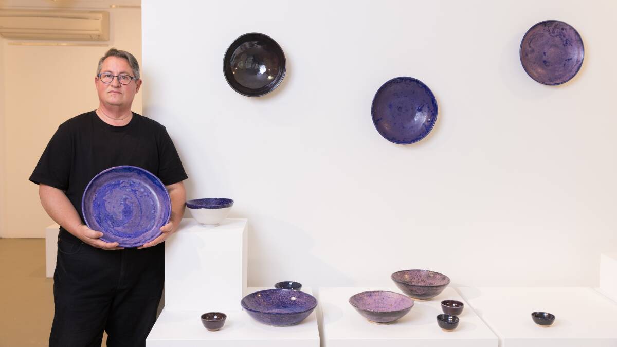 James Collier uses purples and pinks and other joy-reflecting glazes in his celebratory platters. Picture by Sitthixay Ditthavong