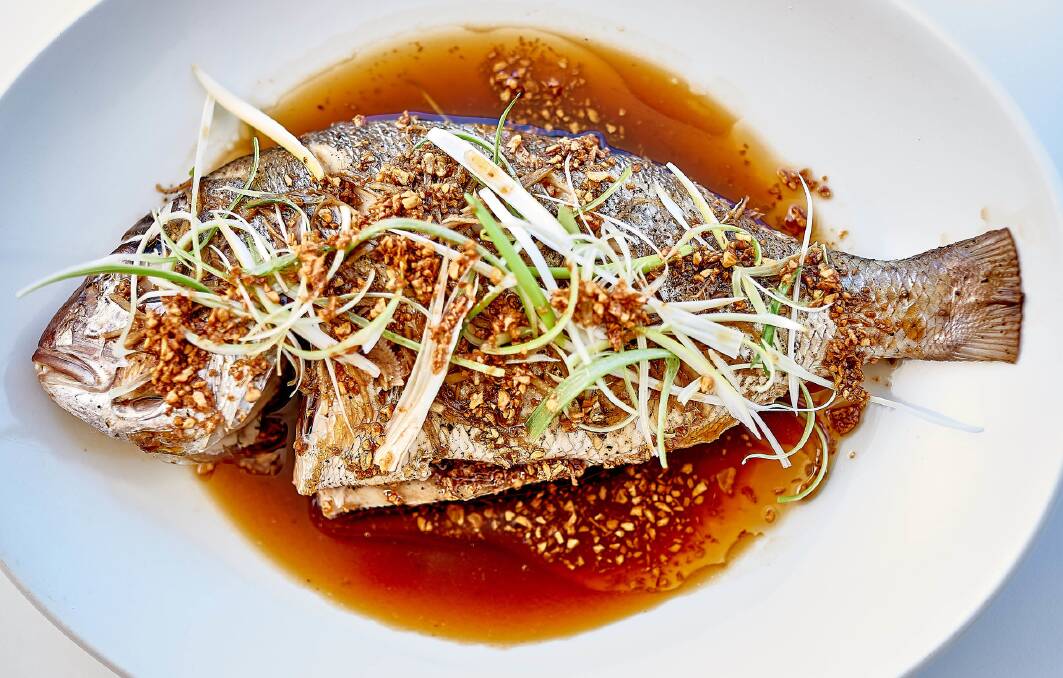 Steamed whole snapper with ginger, soy sauce, sesame oil, crispy garlic and shallots. Picture supplied