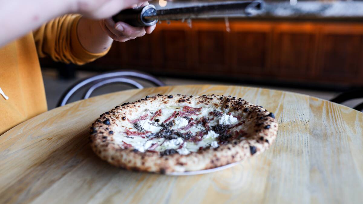 A truffle and prosciutto pizza from Pizza Artigiana. Picture: Zachary Griffith