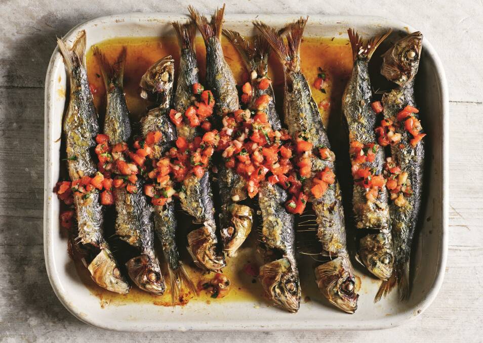 Grilled sardines with a tomato, garlic and thyme dressing. Picture: James Murphy