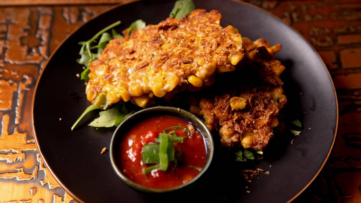 Perkedel Jagung. Indonesian corn fritters served with a spicy home made relish. Picture: Sitthixay Ditthavong