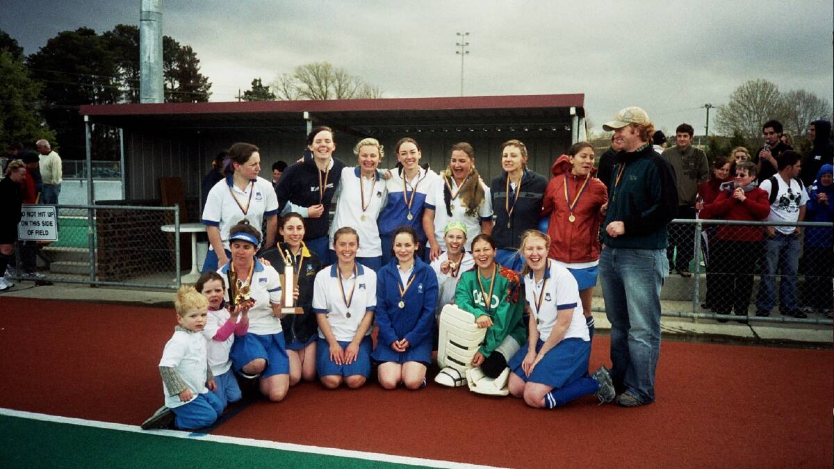 Our winning 2006 team, celebrating with my children, far left. Picture: Supplied