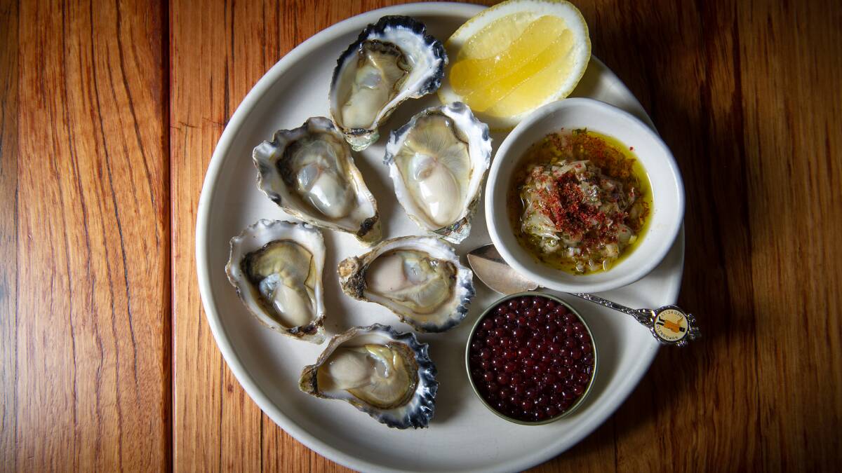 Appellation Sydney rock oysters with pomelo and pink peppercorn and Yarra Valley shiraz gin caviar. Picture by Elesa Kurtz
