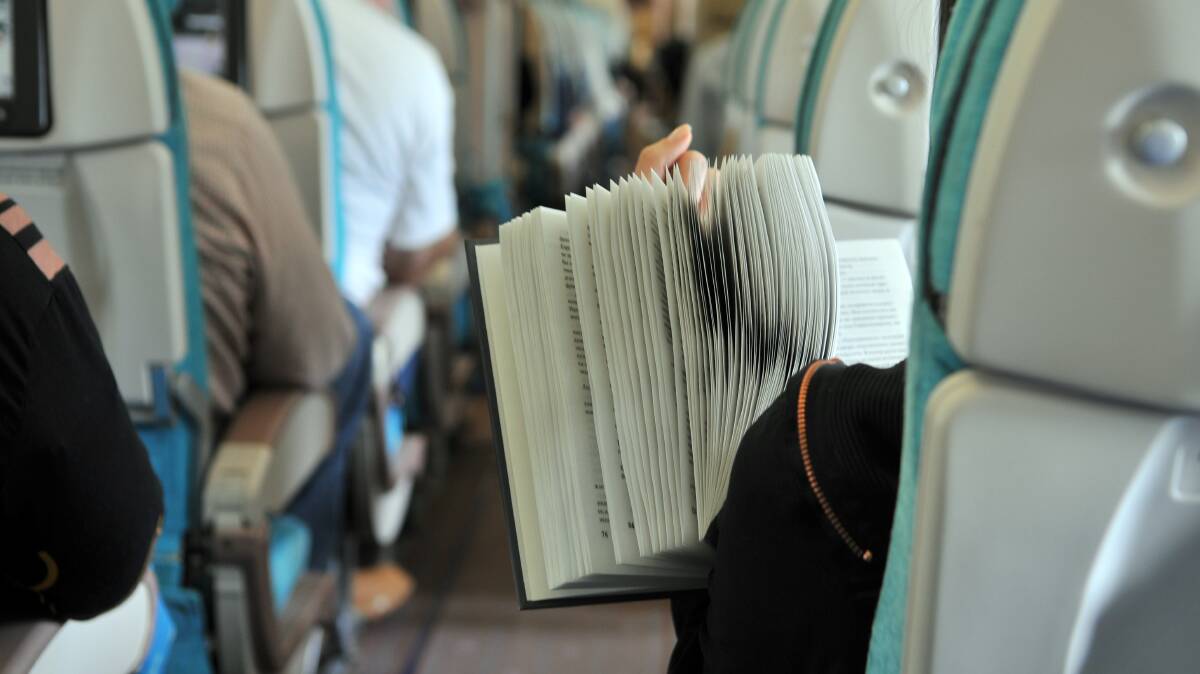 Forget about excess baggage, always pack an actual book. Picture Shutterstock